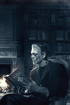 a man sitting in a chair reading a book with a fireplace behind him and bookshelves on either side
