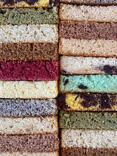 several different colored pieces of bread stacked on top of each other