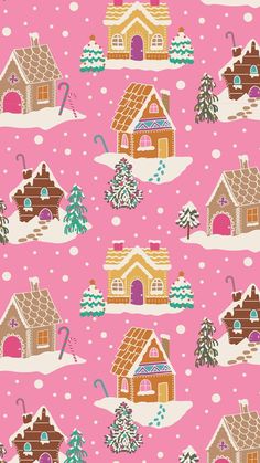 a pink background with houses and trees in the snow on top of eachother
