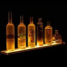 LED lighted liquor bottle shelf is made from sturdy acrylic. This bottle display comes with wireless remote control. Available from 2-8 feet long.