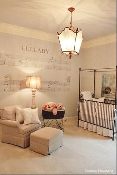 a baby's room with musical notes on the wall