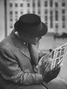 size: 24x18in Photographic Print: Man Reading a Newspaper While Wearing a Fedora Hat with a Flattened Top and Slim Brim by Ralph Morse : Artists Vintage Photos, Vintage, Reading, Tops, Thriller, Readers, Dapper, Ralph, Man