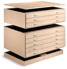 three drawers stacked on top of each other with one drawer open and the other closed