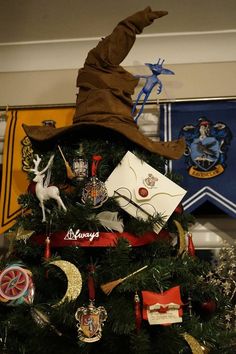 a harry potter christmas tree with decorations on top