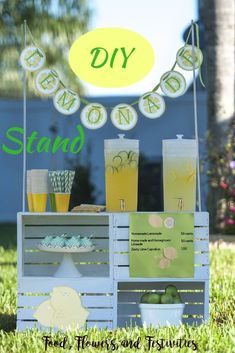 an outdoor stand with drinks and decorations on it