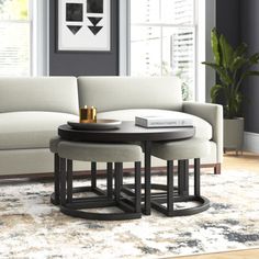 a living room scene with focus on the couch and coffee table in the center area