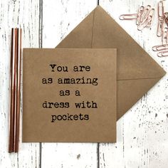 two greeting cards with the words you are as amazing as a dress with pochets