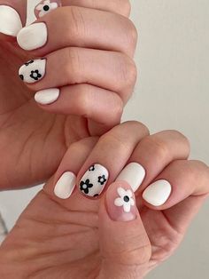 short white nails with black flowers