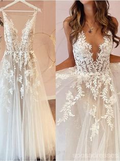 a white wedding dress with flowers on it