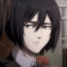 a close up of a person with black hair and an anime avatar in the background