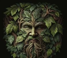 a green man's face surrounded by leaves