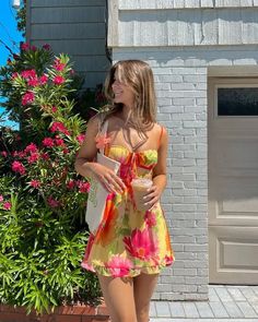Bask in the glow of the summer sun with this playful summer floral dress outfit. It’s as if this dress was made for sipping iced lattes and strolling through weekend markets.   Photo credit by: pixelatedboutique.com Fotografia, Cute Beachy Outfits, Vestidos, Beach Dress Photoshoot, Dress, Cute Casual Outfits, Picnic Outfits