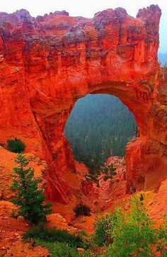 an arch in the side of a mountain