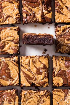 chocolate peanut butter brownies are cut into squares and stacked on top of each other