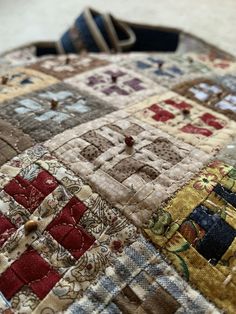 a close up view of a patchwork quilt