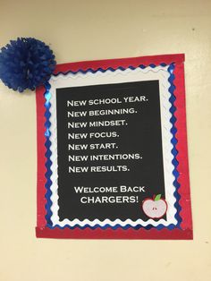 a school bulletin board with an apple on it and a pom - pom