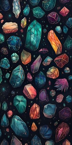 many different colored crystals on a black background