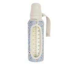 a thermos bottle with a measuring tape attached to it's side, on a white background
