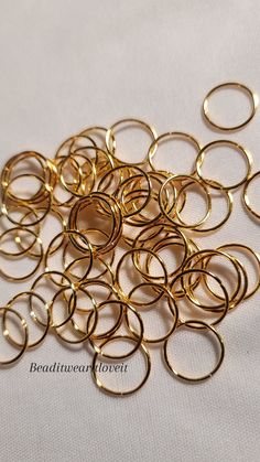 10pcs Gold Hair Rings Perfect For Dreadlocks, Braids, Twist, Plaits, Buns & Up-dos -Ring sizes ranging from 5mm very small to large 14mm -Perfect for locs, braids, and twist of all sizes -Add hair rings to a variety of hair styles for a classic and unique look. Simply open ring by twisting gently sideways. Apply to desired location then gently twist back together. Do not pull apart, this may cause the ring to loose its shape. Caring for most jewelry jewelry... Depending on the type of jewelr Plaits, Metal Jewellery, Braided Ring, Loc Jewelry, Hair Rings, Metal Jewelry, Twist, Twist Styles, Copper Jewelry