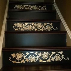 the stairs are painted black and gold