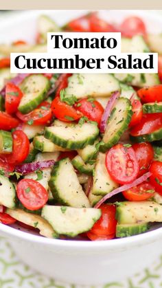 cucumber and tomato salad in a white bowl on a green patterned tablecloth