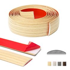 a roll of wood veneers with red tape next to it and two different colors