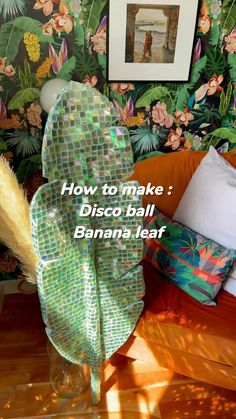 a room with wallpaper, pillows and pictures on the walls that say how to make disco ball banana leaf