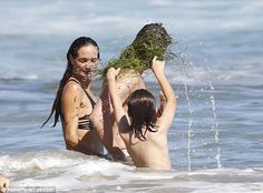 Surf's up: With LA basking in record heat, the interior designer was happy to cool off in the ocean with her beau by her side Surf's Up, Interior, Surfs Up, Malibu, Bikini Bodies, Perfect Bikini Body