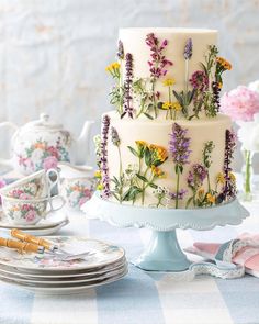 With a bounty of jewel-toned blossoms at hand, the season of rejuvenation is best celebrated around a table laden with floral-infused recipes. Find the recipe for this Lavender Chamomile Tiered Cake and a fête of blooming delights at https://bit.ly/victoriafloralrecipes. Decoration, Cake, Wedding Cakes, Tart, Floral, Hochzeit, Kage, Floral Cake, Backen