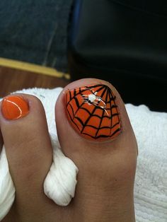 Halloween pedicure by jessicafm, via Flickr