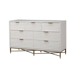 a white dresser with gold handles and drawers on the bottom, in front of a white background