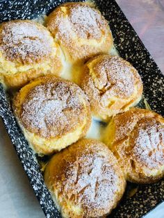 two pictures showing different types of pastries in baking pans with powdered sugar on top