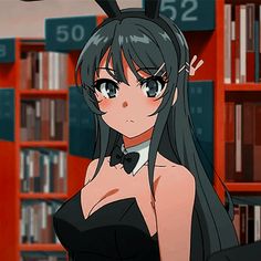 an anime character with long black hair in front of bookshelves