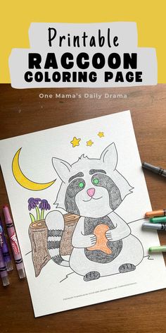 a raccoon coloring page with markers and crayons on the table next to it