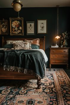a bed sitting on top of a rug next to a wooden dresser and lamp in a bedroom