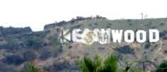 the hollywood sign is surrounded by trees and bushes
