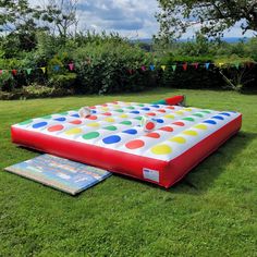 an inflatable game set up on the grass