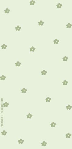 a green wallpaper with small flowers on it