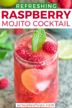 raspberry mojito cocktail in a glass with lime and mint garnish