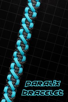 an image of a blue and black chain on a black background with the words paralla bracelet