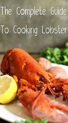 the complete guide to cooking lobster on a plate with lemon and parsley next to it