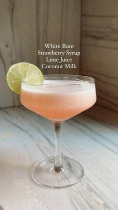 a white rum strawberry syrup and coconut milk cocktail