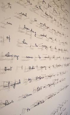 the writing on the wall is written in cursive black and white inks