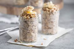 two glass jars filled with oatmeal and nuts