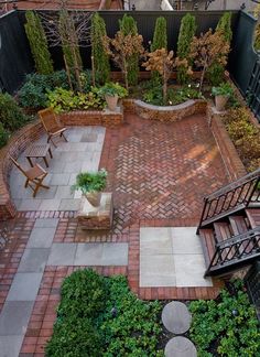 an aerial view of a patio and garden