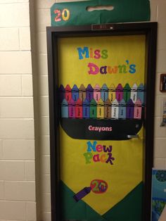 a door decorated with the names of many different children's books and pencils