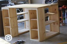 a workbench made out of plywood and wood