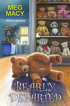 a teddy bear sitting on the floor in front of a book shelf filled with stuffed animals
