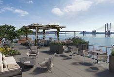 an artist's rendering of a patio with seating and tables overlooking the water in front of a bridge