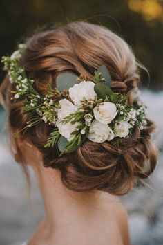Flower crowns aren't only for summer weddings. This forest greenery will make your hair stand out on your special day!